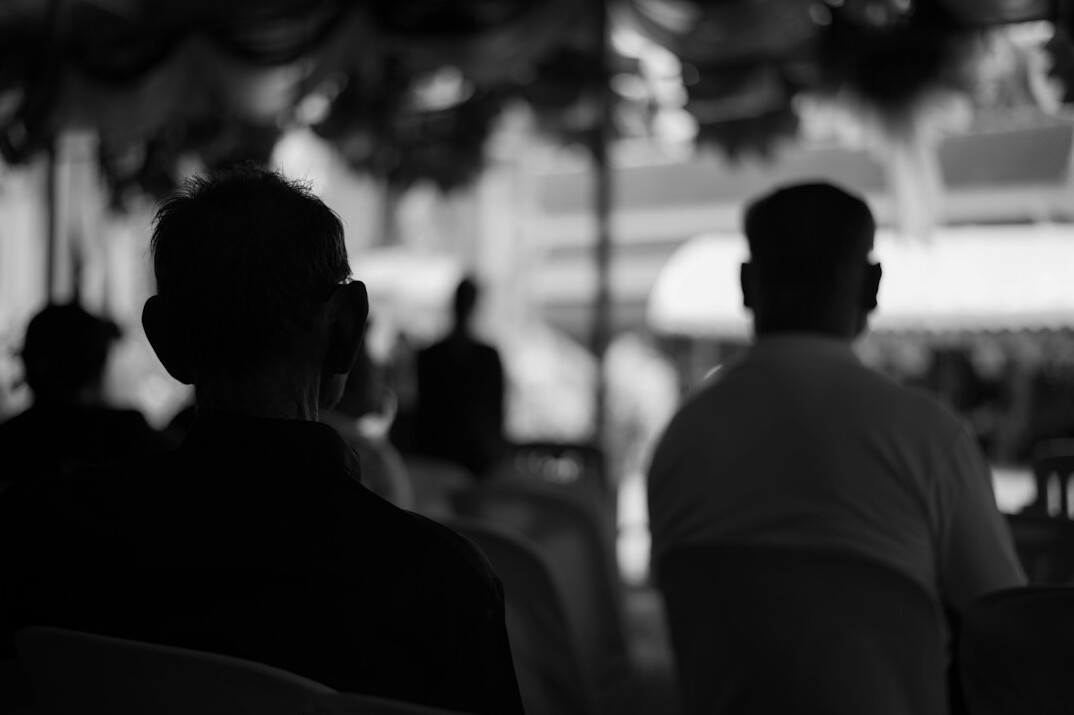 Executives discussing around a meeting table